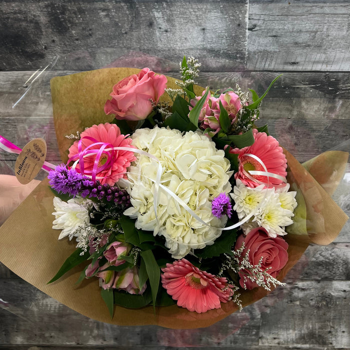 Treat that someone special with seasonal flowers!